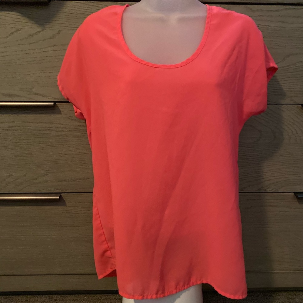 Shear top with zipper on back